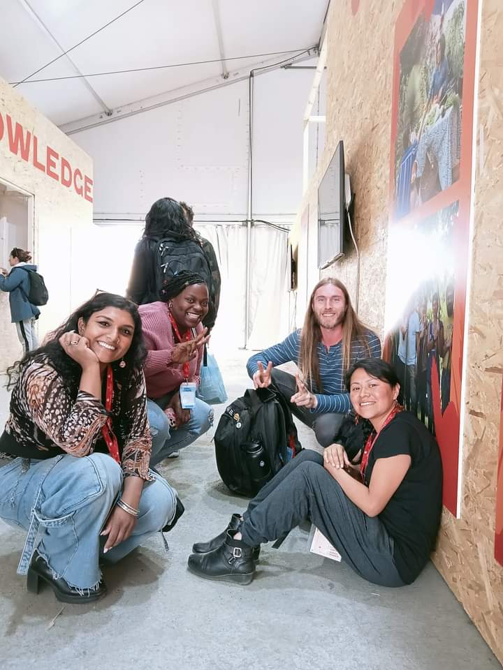 Our very own, Jasmine Bryant, representing Women With Vision, Inc., was invited by Rooted East to attend Terra Madre 2024. Pictured above are Laila Malik, Tom Ruggles, Jasmine Bryant, and Guadalupe Tzopiti at the Terra Madre 2024 conference in Turin, Italy, engaging in discussions on global food systems and sustainability.